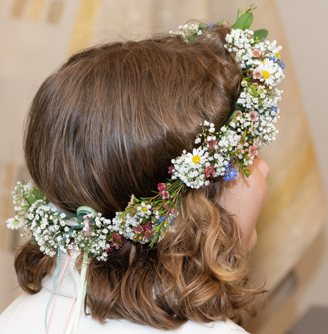 Rückgabe der Einheitskleider für Erstkommunionkinder